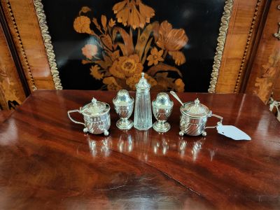 Five piece silver cruet set with mustard spoon