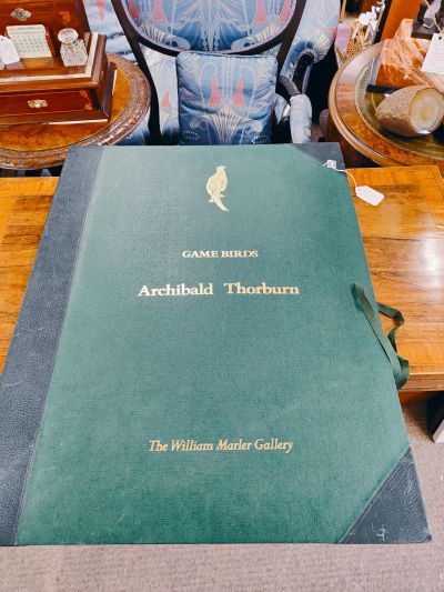 Two archibald thorburn game bird prints in folder