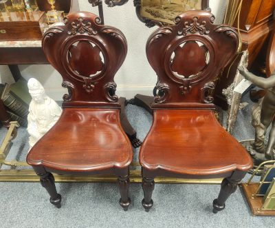 Pair of victorian mahogany hall chairs