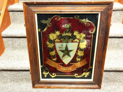 Oak framed mirrored glass coat of arms