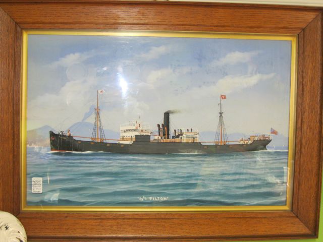 An oak framed water colour drawing