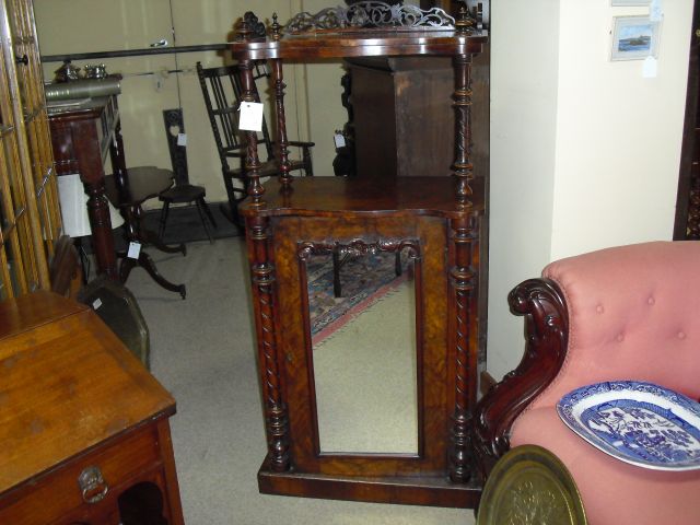 A Victorian walnut cabinet.
